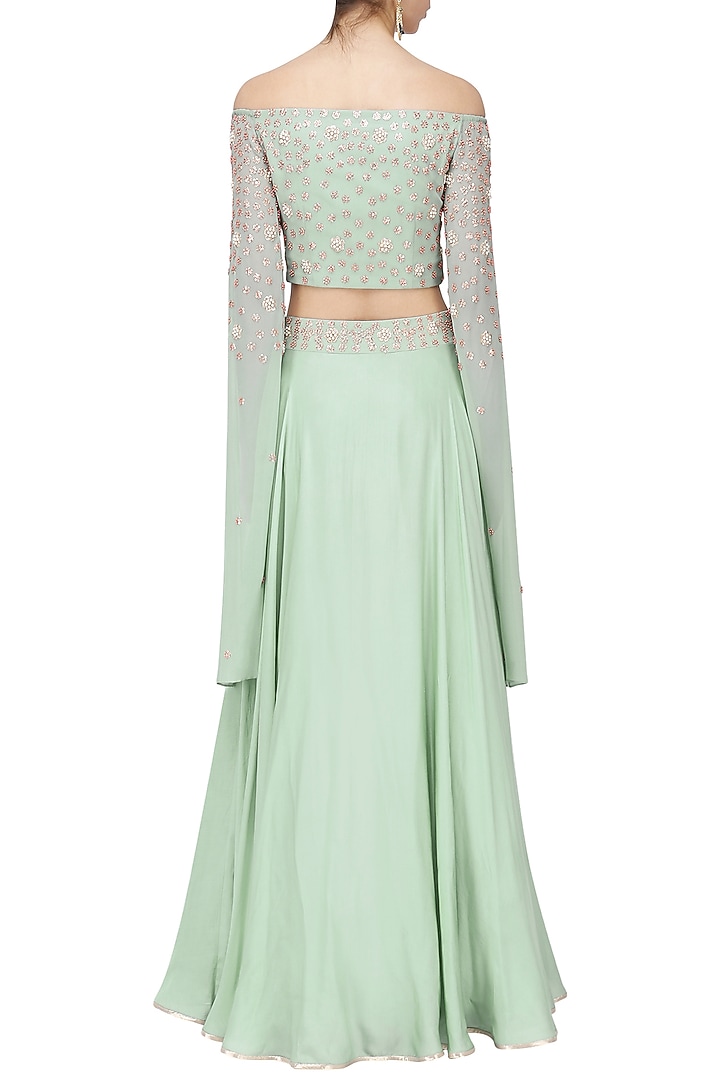 Dusky green embroidered crop top and skirt set available only at Pernia's Pop Up Shop.