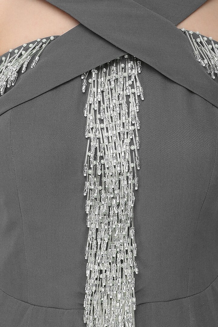 Grey embroidered pleated criss-cross jumpsuit available only at Pernia's Pop Up Shop.