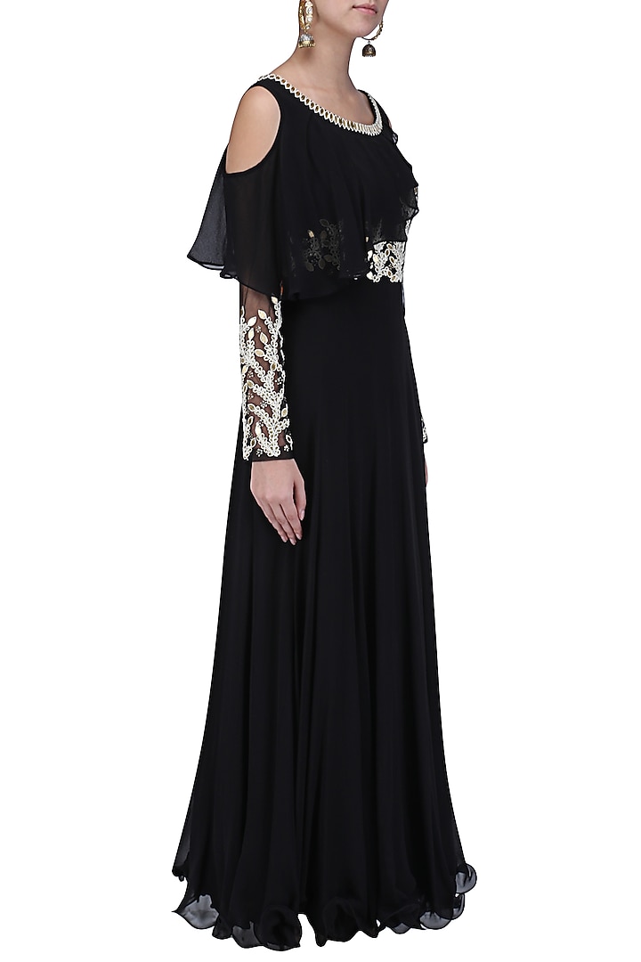 Black embroidered cold shoulder gown with attached ruffle available only at Pernia's Pop Up Shop.