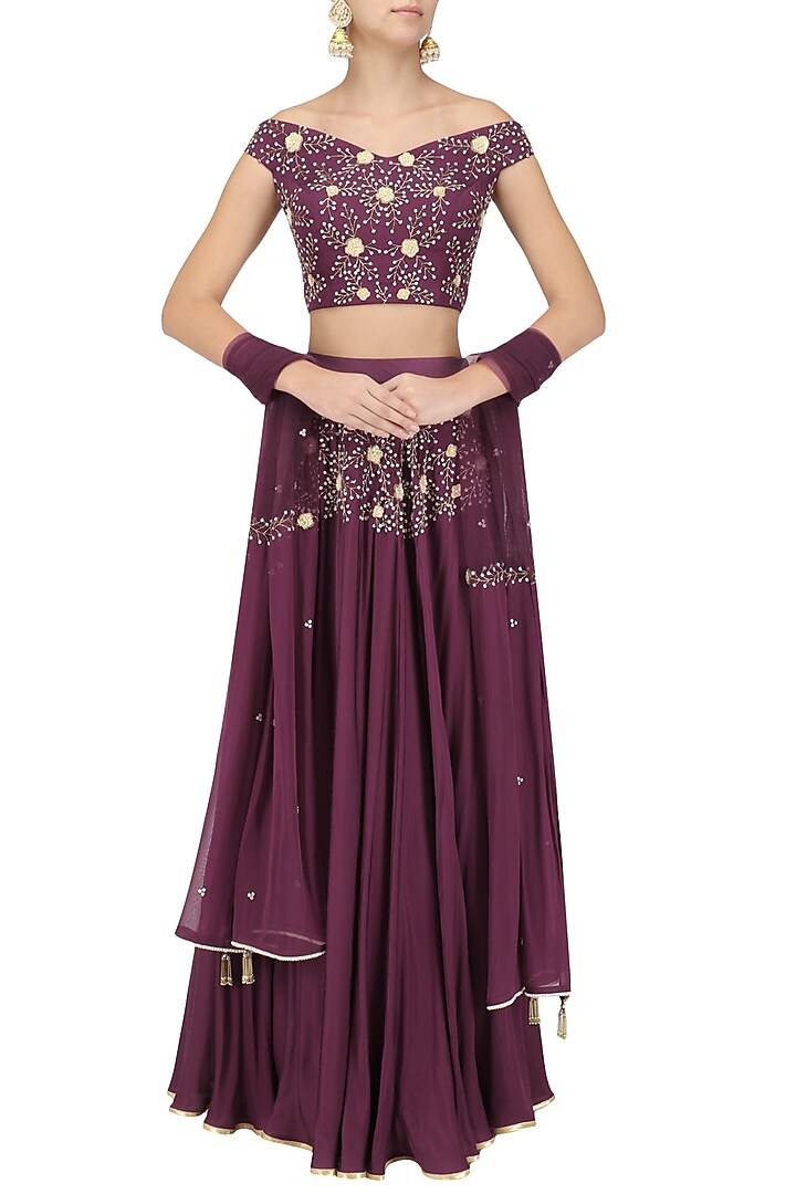 Wine embroidered off shoulder lehenga set available only at Pernia's Pop Up Shop.