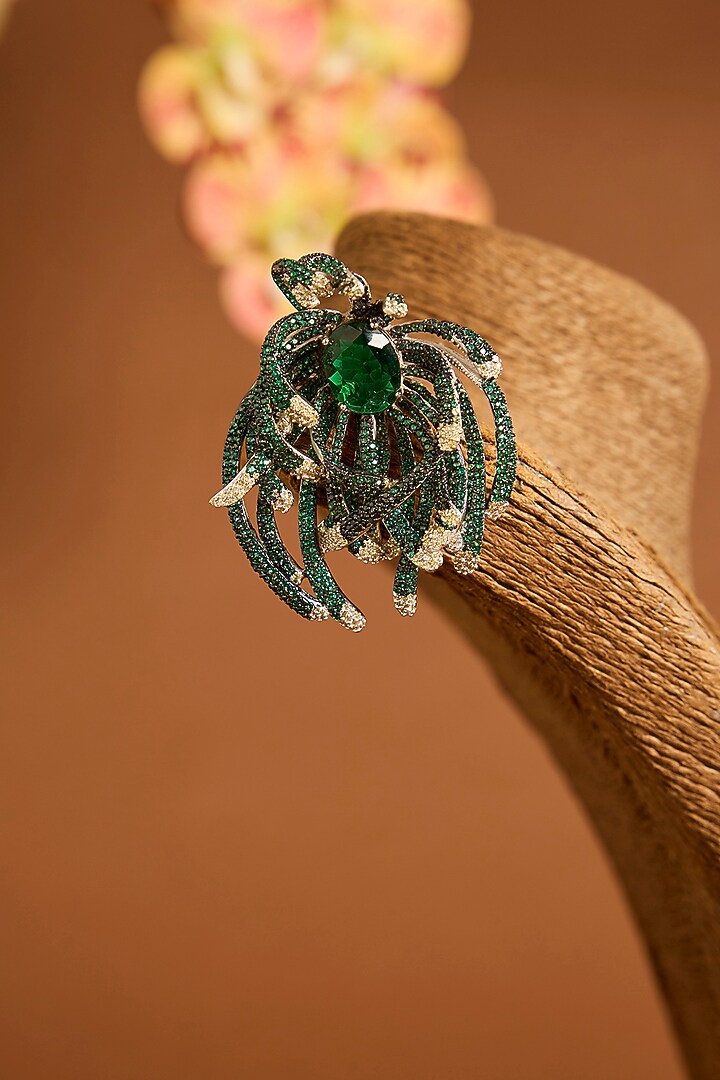 White Gold Finish Eurostar Swarovski & Emerald Brooch In Sterling Silver by STELLA CREATIONS at Pernia's Pop Up Shop