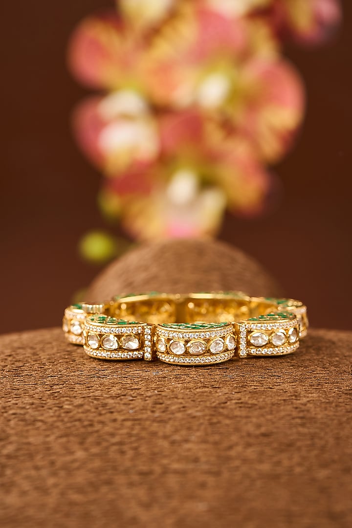 Yellow Gold Finish Moissanite Polki & Emerald Stone Bangle In Sterling Silver by STELLA CREATIONS at Pernia's Pop Up Shop