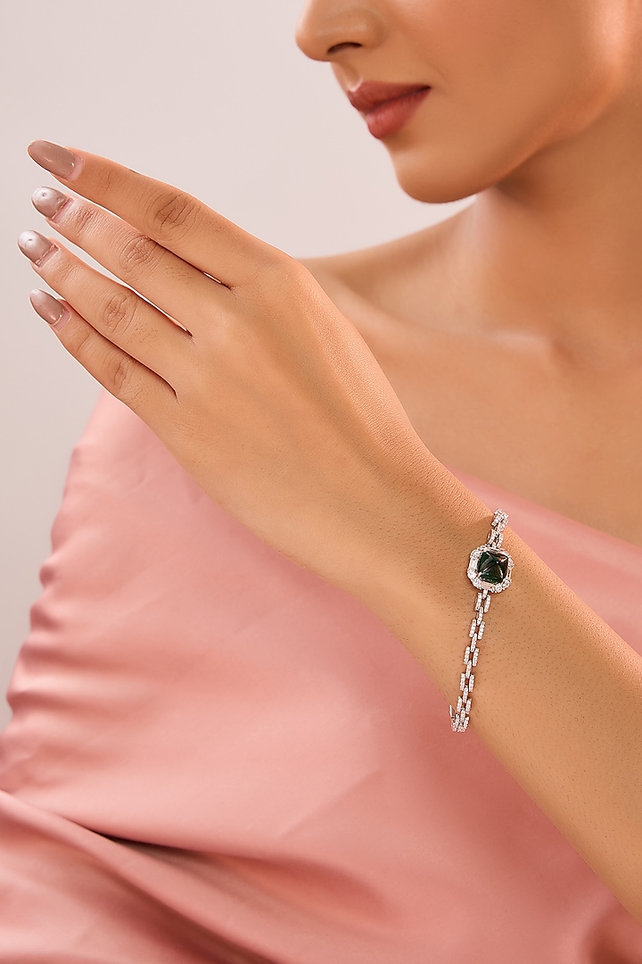 White Gold Finish Zircon & Emerald Stone Bracelet In Sterling Silver by STELLA CREATIONS at Pernia's Pop Up Shop