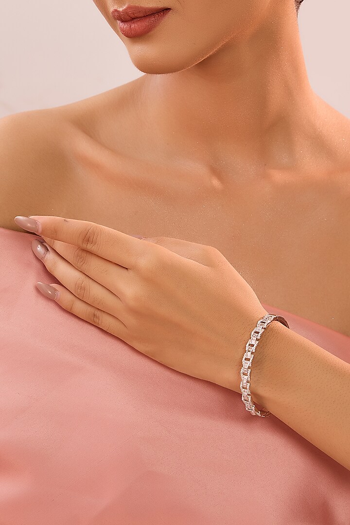 White Gold Finish Eurostar Zircon Bangle In Sterling Silver by STELLA CREATIONS at Pernia's Pop Up Shop