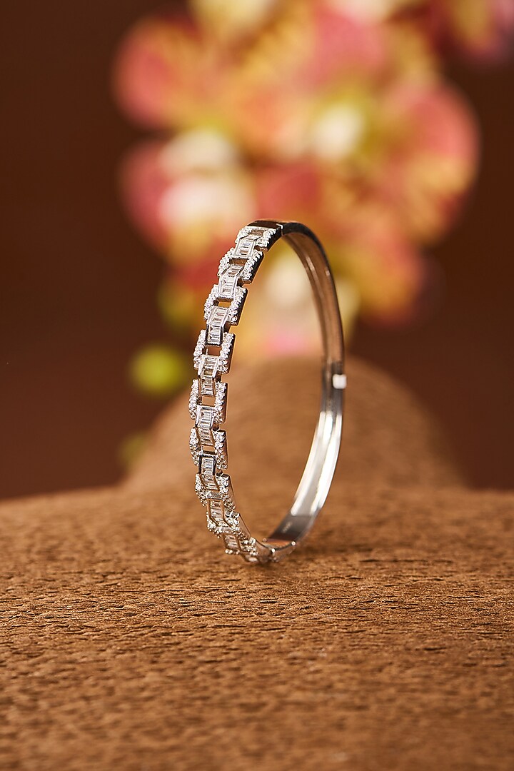 White Gold Finish Eurostar Zircon Bangle In Sterling Silver by STELLA CREATIONS at Pernia's Pop Up Shop