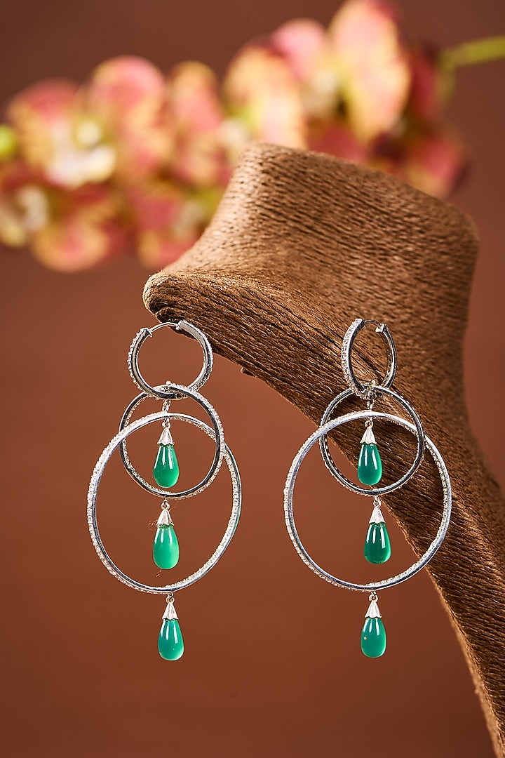 White Gold Finish Eurostar Zircon & Emerald Stone Hoop Earrings In Sterling Silver by STELLA CREATIONS at Pernia's Pop Up Shop