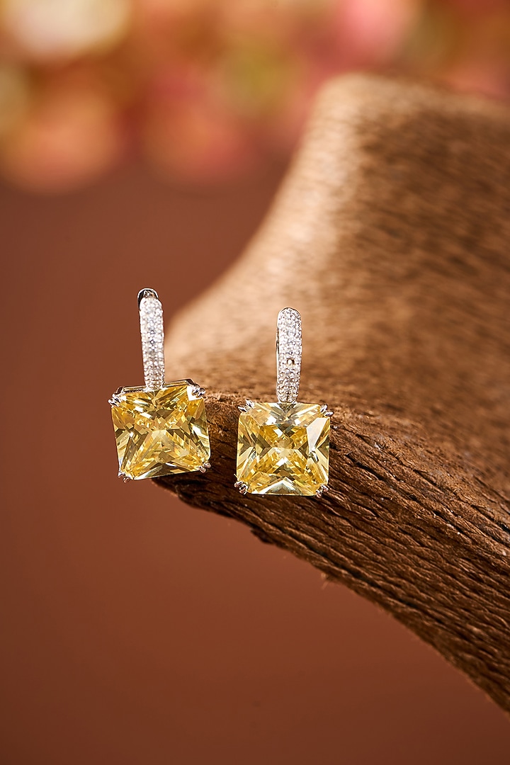 White Gold Finish Eurostar Zircon & Yellow Sapphire Stone Hoop Earrings In Sterling Silver by STELLA CREATIONS at Pernia's Pop Up Shop