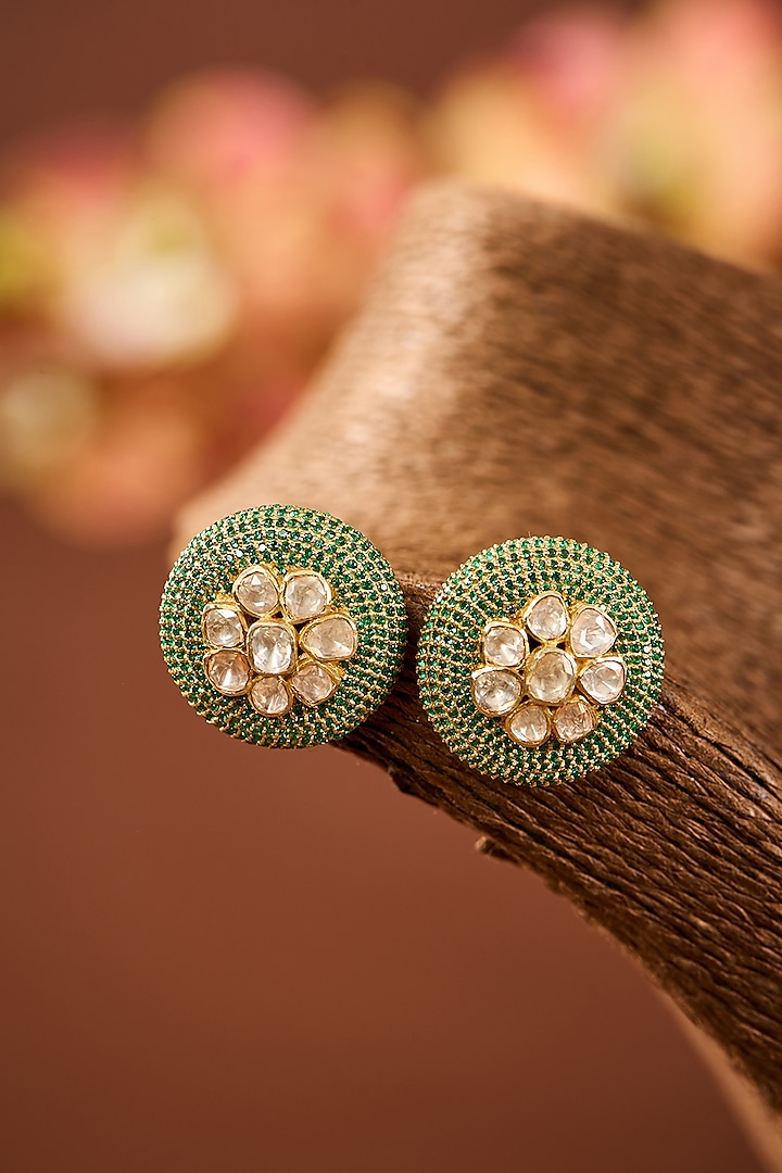 Yellow Gold Finish Moissanite Polki & Emerald Stone Stud Earrings In Sterling Silver by STELLA CREATIONS at Pernia's Pop Up Shop