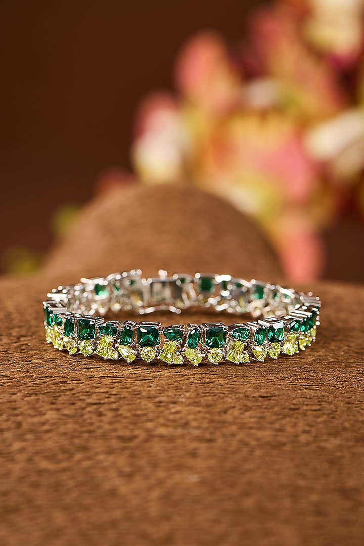 White Gold Finish Eurostar Zircon & Emerald Stone Bracelet In Sterling Silver by STELLA CREATIONS at Pernia's Pop Up Shop