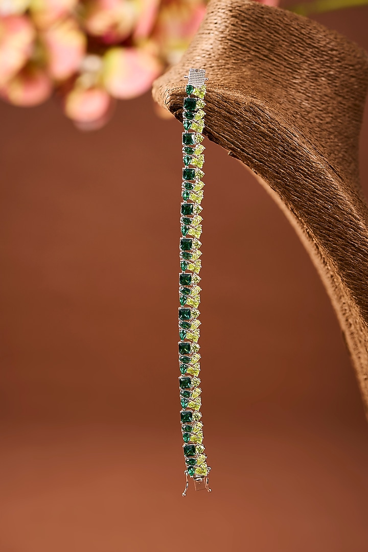 White Gold Finish Eurostar Zircon & Emerald Stone Bracelet In Sterling Silver by STELLA CREATIONS at Pernia's Pop Up Shop