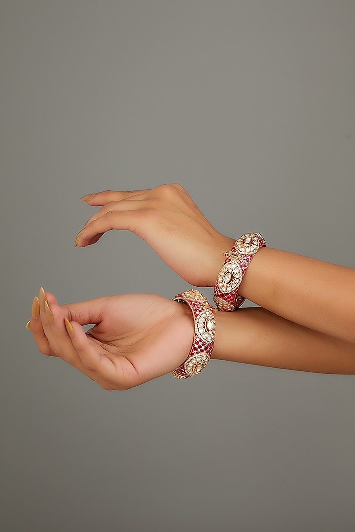 Gold Finish Kundan Polki Red Enameled Bangles (Set of 2) by Studio6 Jewels at Pernia's Pop Up Shop