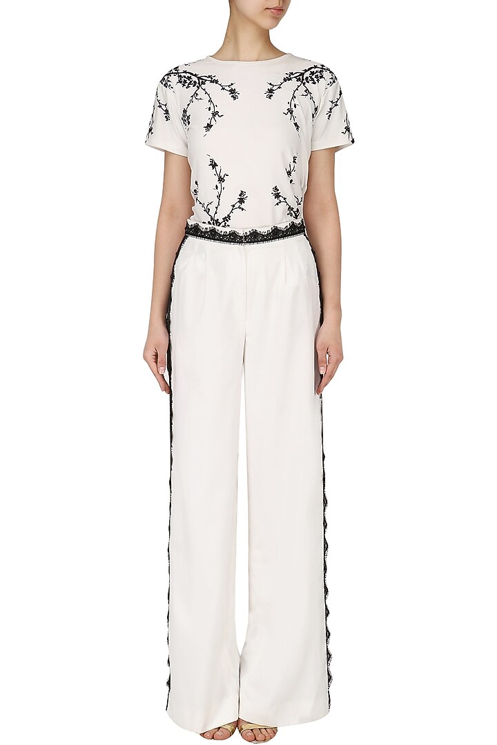 Ivory lace trim pants available only at Pernia's Pop Up Shop.