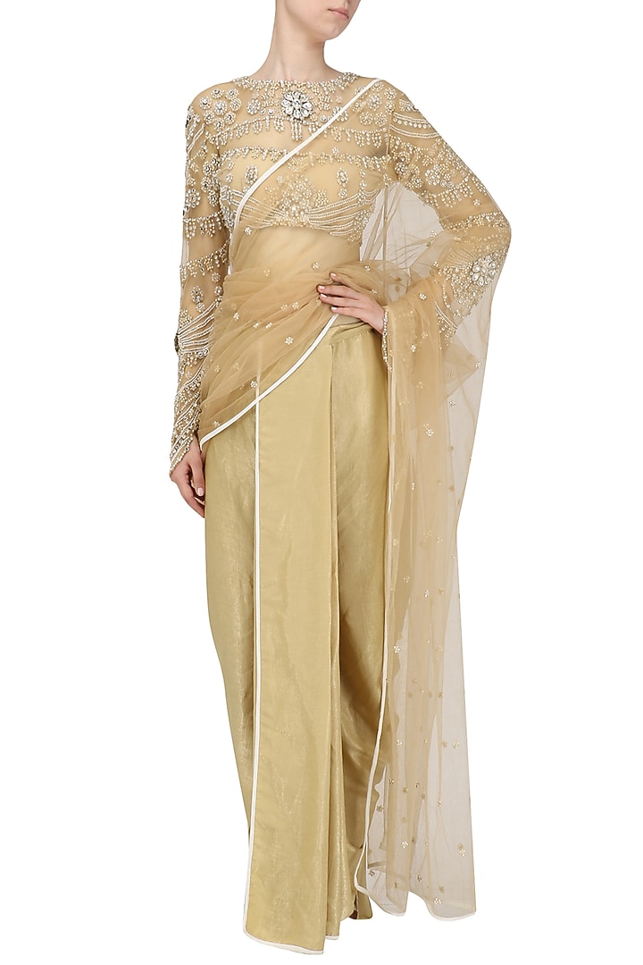 Nude embroidered blouse with dhoti pants set available only at Pernia's Pop Up Shop.