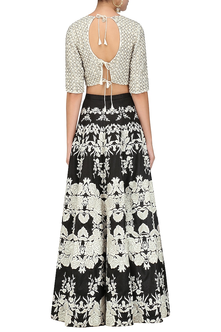 Black kalidaar lehenga and ivory blouse set available only at Pernia's Pop Up Shop.
