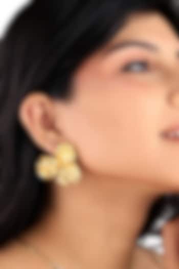 Gold Finish Brass Textured Floral Stud Earrings by SUCRA at Pernia's Pop Up Shop