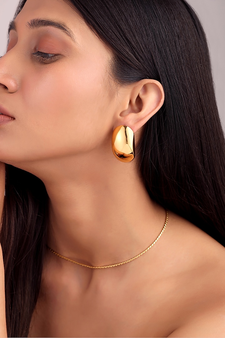 Gold Finish Brass Sculpted Stud Earrings by SUCRA at Pernia's Pop Up Shop