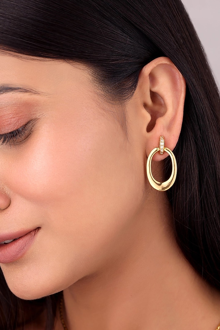 Gold Finish Cubic Zirconia Halo Oval Earrings by SUCRA at Pernia's Pop Up Shop