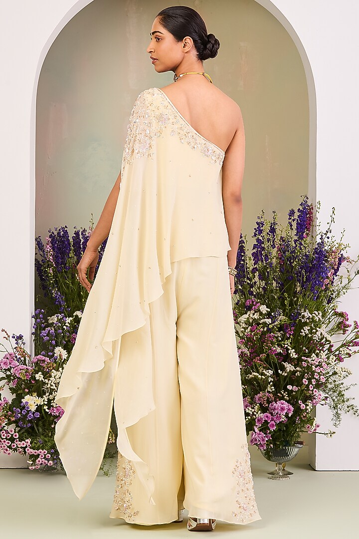 Light Yellow Pure Georgette Pearl Embroidered One Shoulder Jumpsuit by Sue Mue at Pernia's Pop Up Shop