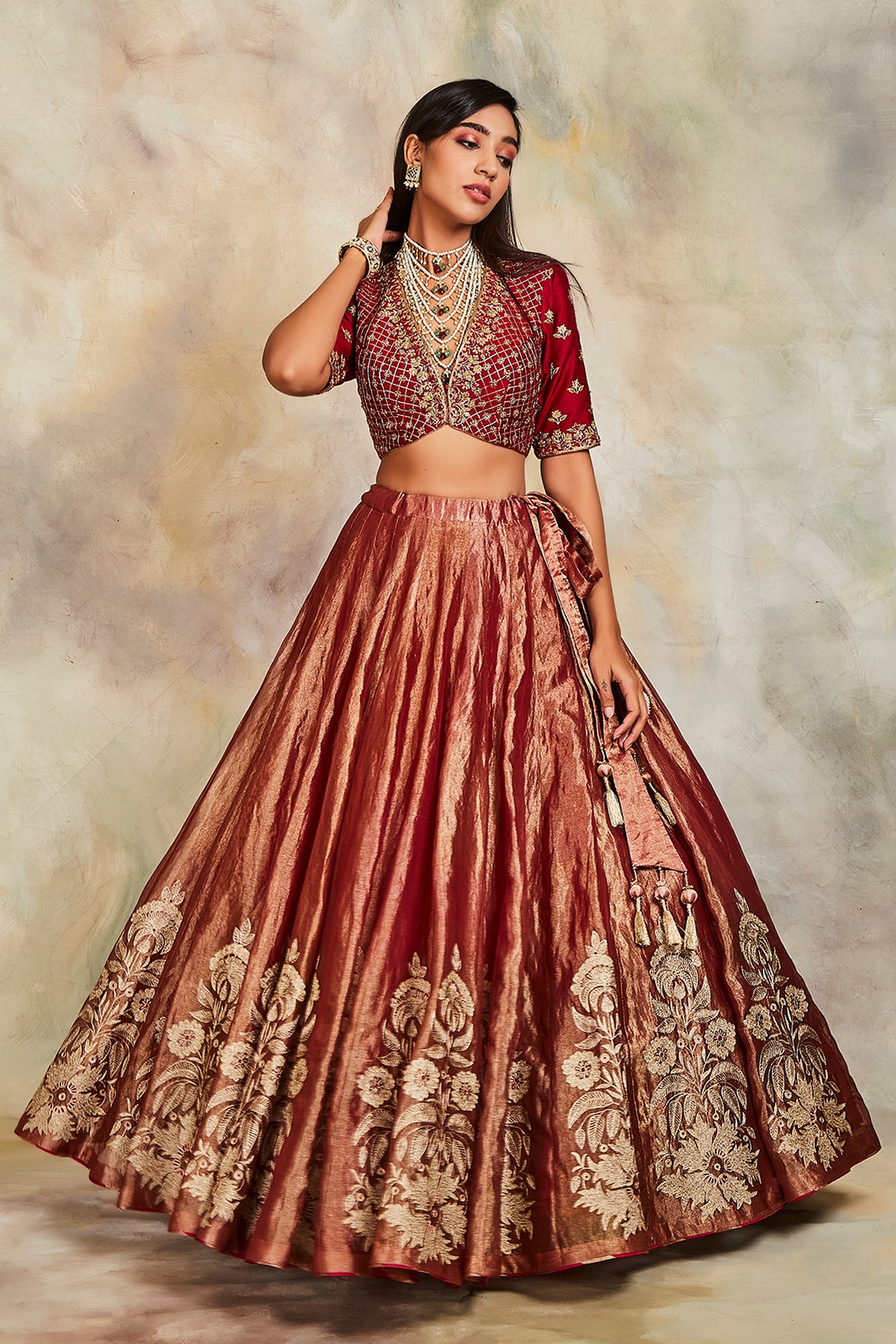 Niti Taylor in Kalki maroon lehenga and off shoulder blouse intricated  zardosi and resham embroidery only on kalki