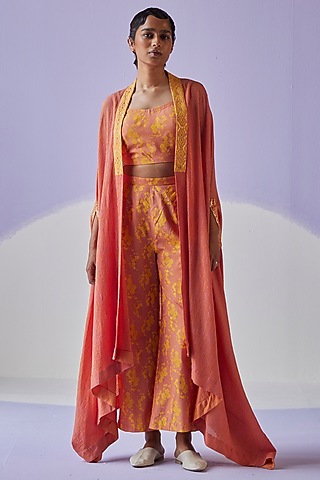 Coral Crinkled Fabric Cape Set by Surbhi Gupta