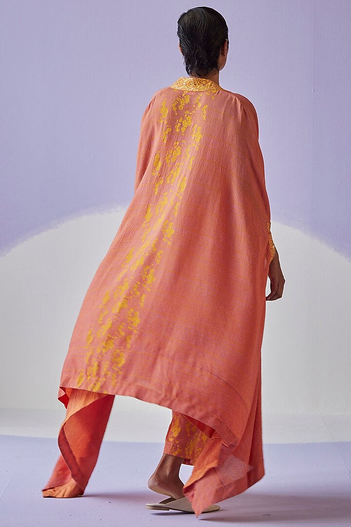 Coral Crinkled Fabric Cape Set by Surbhi Gupta at Pernia's Pop Up Shop