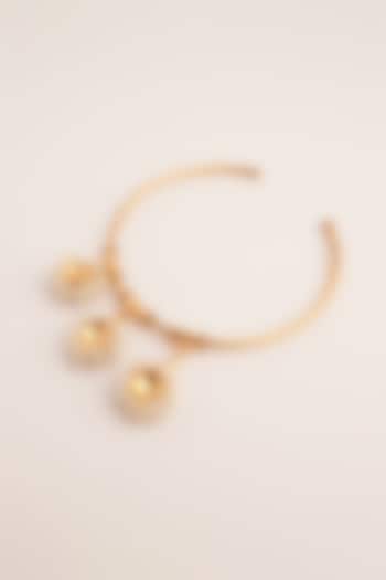 Gold Finish Pearl Hand cuff by Suhani Pittie