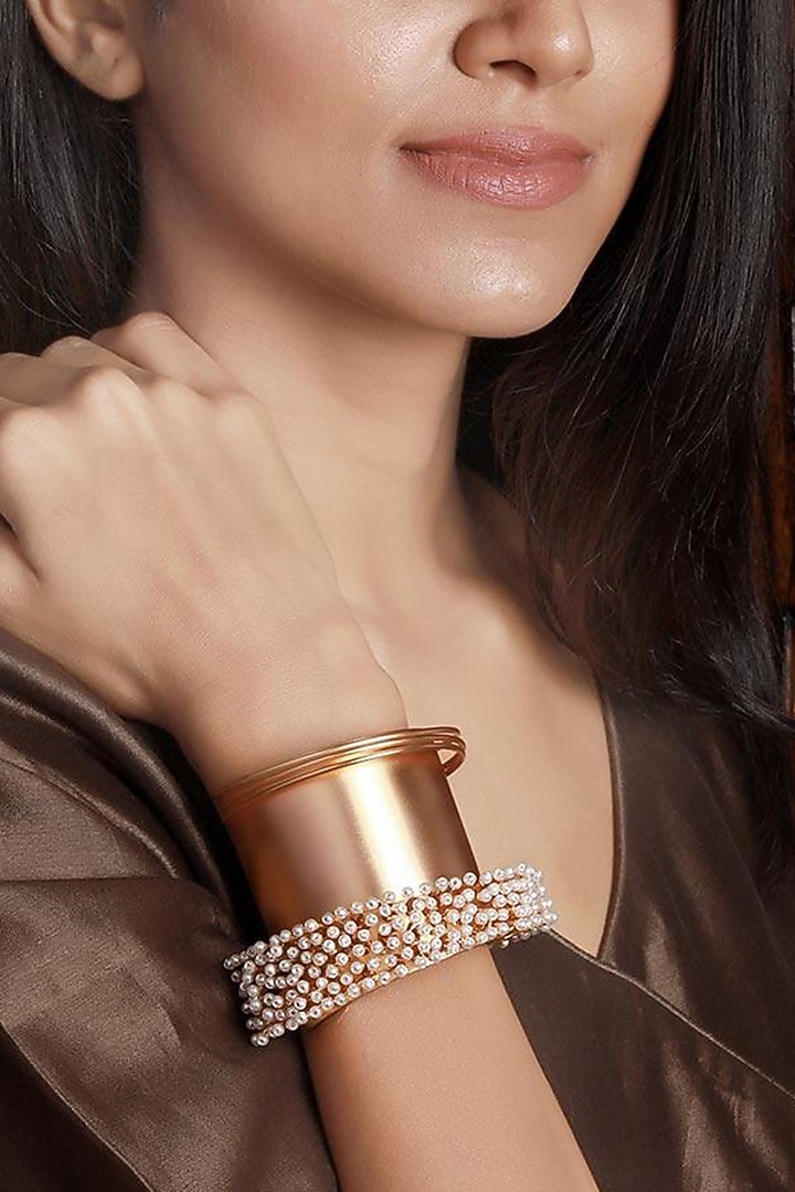 Gold Finish Pearl Cuff by Suhani Pittie at Pernia's Pop Up Shop
