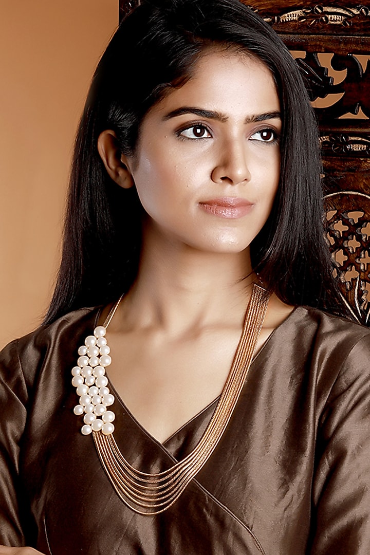 Gold Finish Pearl Long Necklace by Suhani Pittie