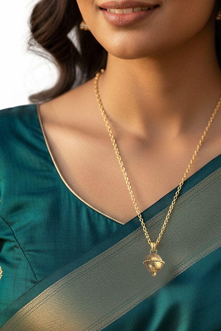 Gold Plated Engraved Ball Pendant Necklace by Suhani Pittie at Pernia's Pop Up Shop