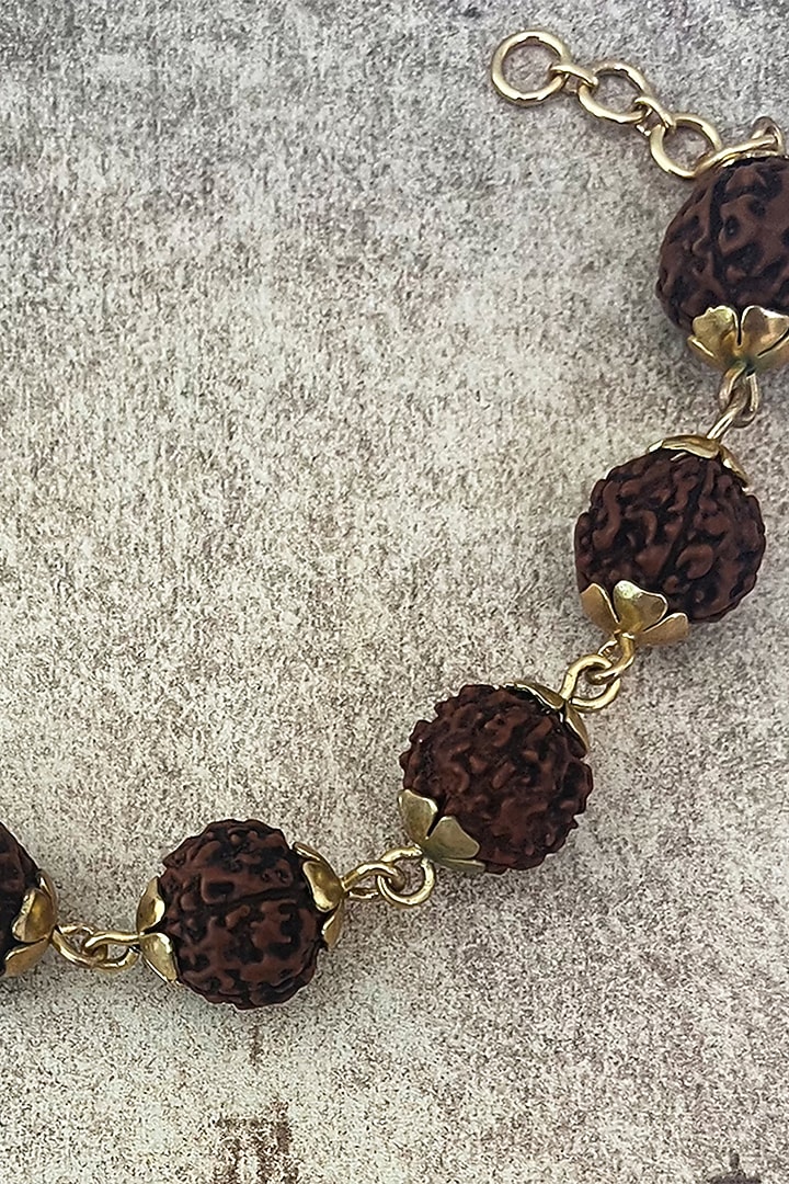 Gold Plated Rudraksha Beaded Handcrafted Bracelet by Suhani Pittie at Pernia's Pop Up Shop
