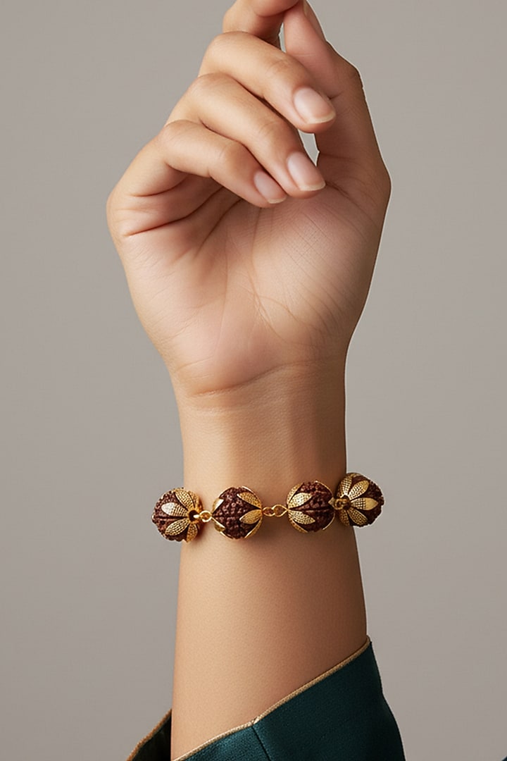 Gold Plated Rudraksha Beaded Handcrafted Bracelet by Suhani Pittie at Pernia's Pop Up Shop