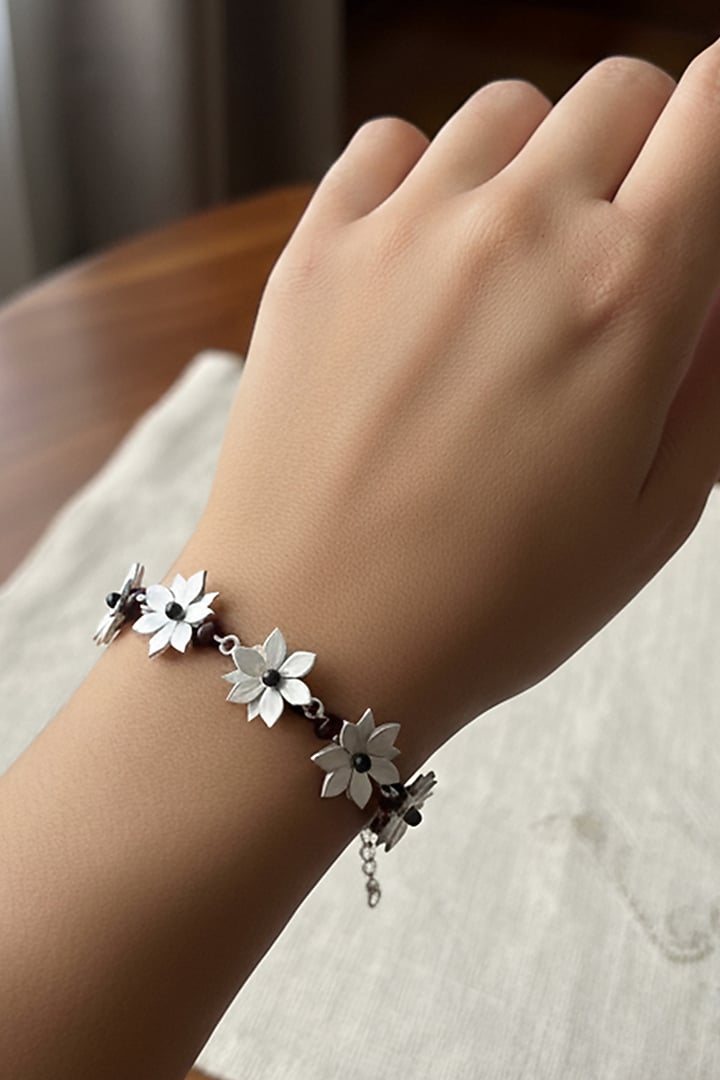 Silver Finish Floral Bracelet by Suhani Pittie at Pernia's Pop Up Shop