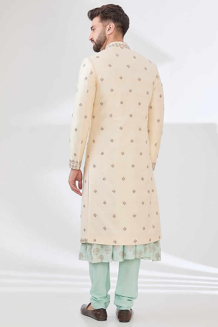 Ivory Raw Silk Dabka Hand Embroidered Groom Sherwani Set by Sulakshna Jasra at Pernia's Pop Up Shop