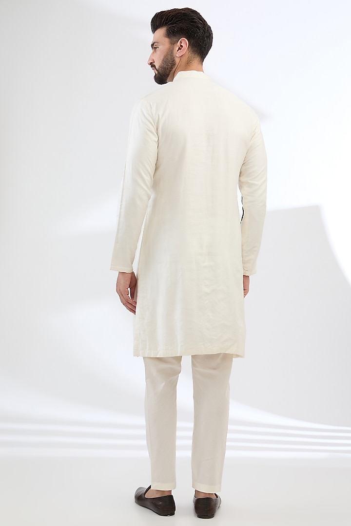 Off-White Tussar Cotton Hand Embroidered Kurta Set by Sulakshna Jasra at Pernia's Pop Up Shop