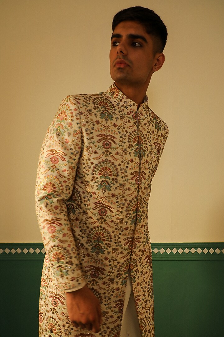 Ivory Dupion Silk Dabka Embellished & Block Printed Wedding Sherwani Set by Sulakshna Jasra at Pernia's Pop Up Shop