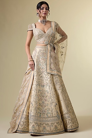Gold Raw Silk Tribal Motif Hand & Machine Embroidered Lehenga Srt by Sulakshana Monga Couture