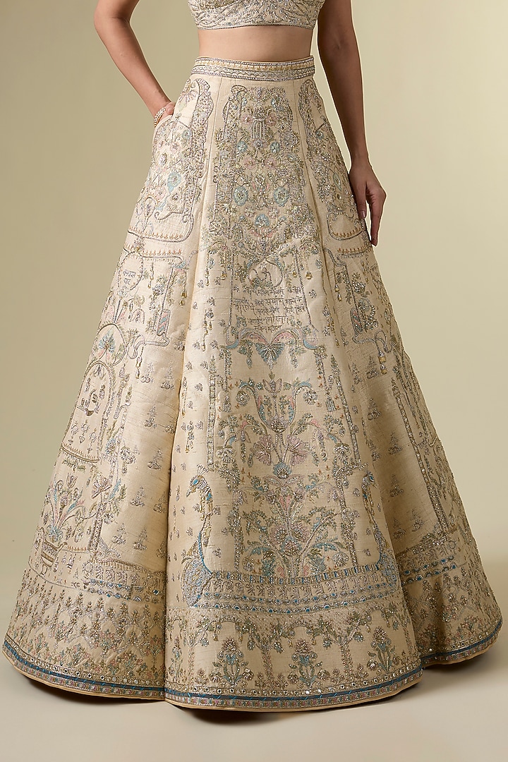 Gold Raw Silk Tribal Motif Hand & Machine Embroidered Bridal Lehenga Srt by Sulakshana Monga Couture at Pernia's Pop Up Shop