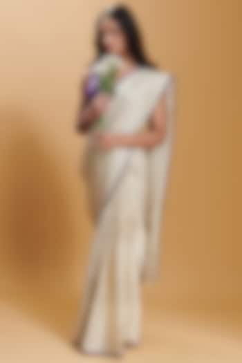 Ivory Handwoven Mulberry Silk Satin Party Wear Saree by Surmaye at Pernia's Pop Up Shop