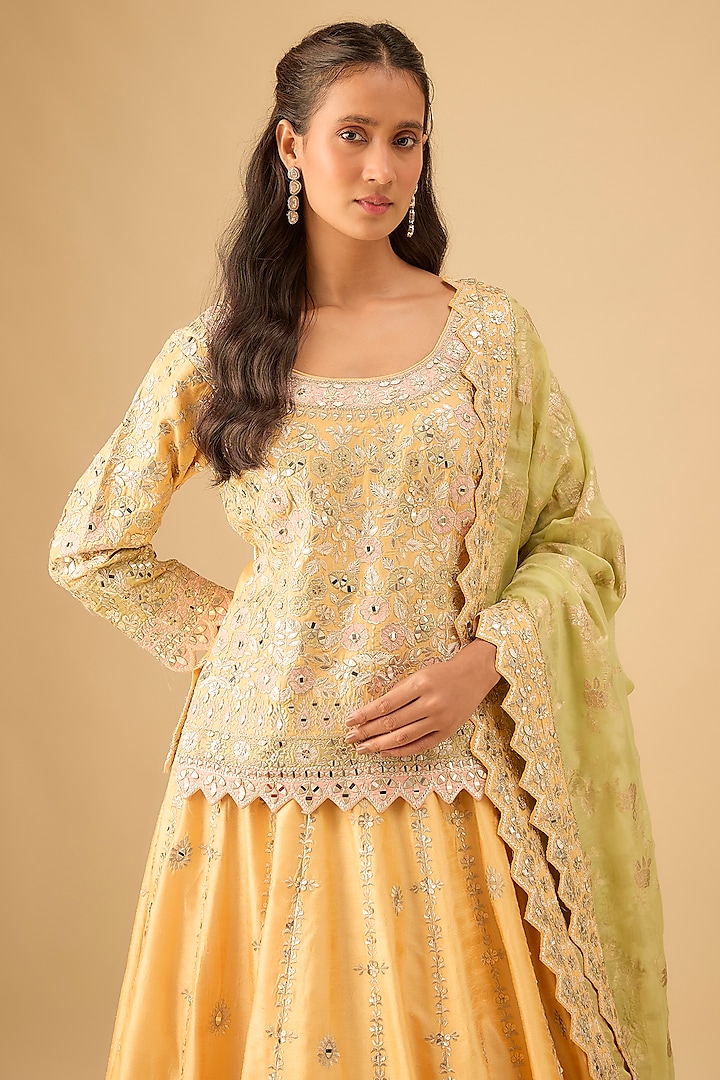Yellow Slub Silk Mirror Embroidered Wedding Lehenga Set by Suhino at Pernia's Pop Up Shop