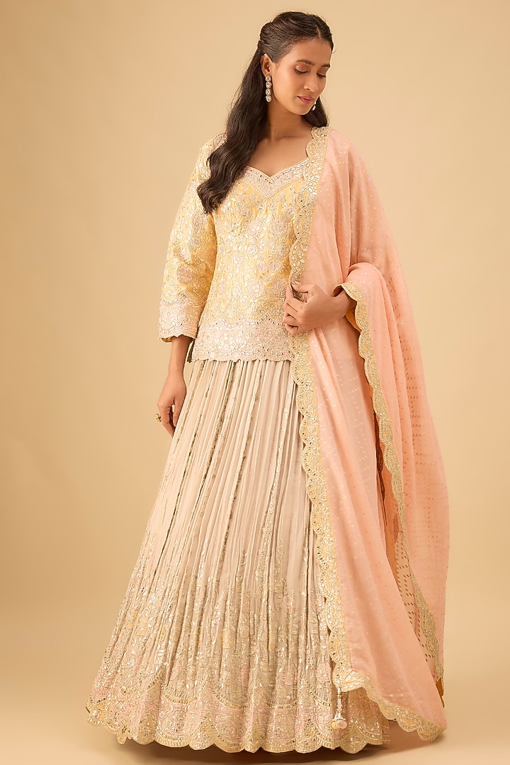 Ivory Tissue Pleated Wedding Lehenga Set by Suhino at Pernia's Pop Up Shop