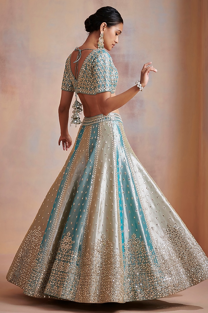 Turquoise & Ivory Embroidered Wedding Lehenga Set by Suhino at Pernia's Pop Up Shop