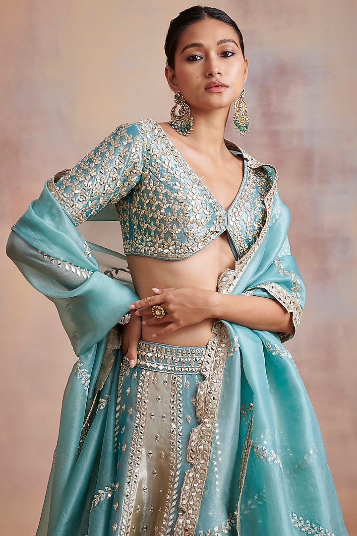 Turquoise & Ivory Embroidered Wedding Lehenga Set by Suhino at Pernia's Pop Up Shop