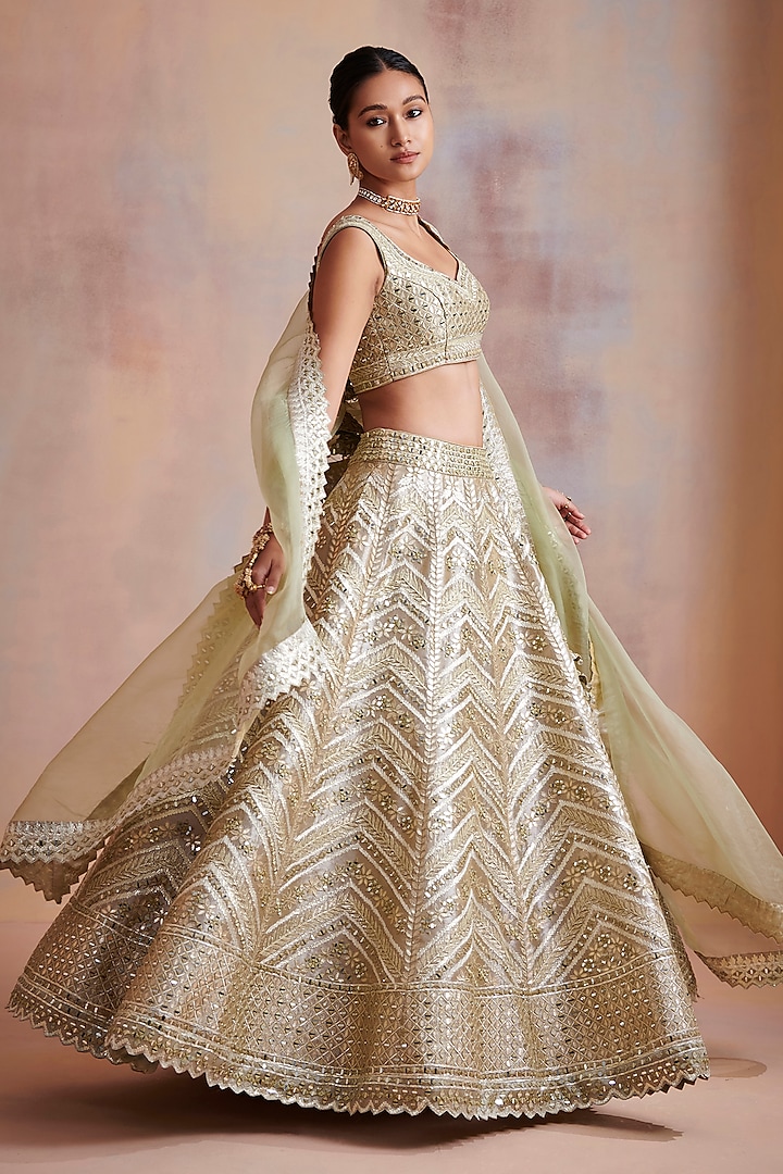 Ivory Embroidered Wedding Lehenga Set by Suhino at Pernia's Pop Up Shop