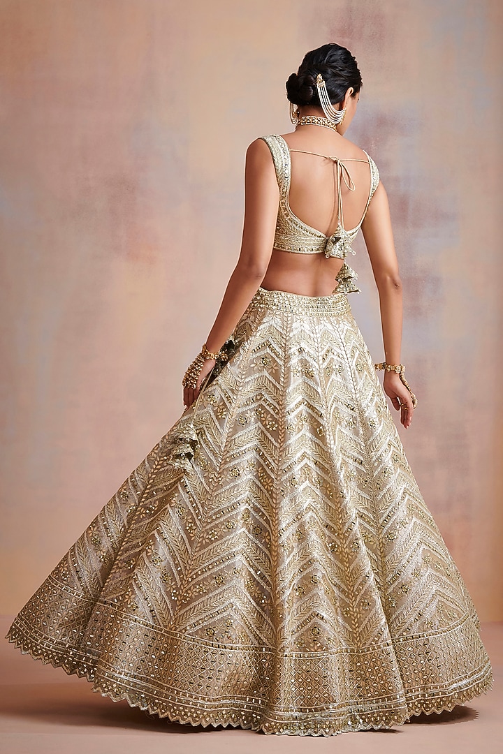 Ivory Embroidered Wedding Lehenga Set by Suhino at Pernia's Pop Up Shop
