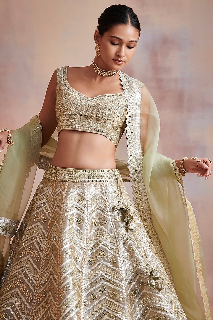 Ivory Embroidered Wedding Lehenga Set by Suhino at Pernia's Pop Up Shop