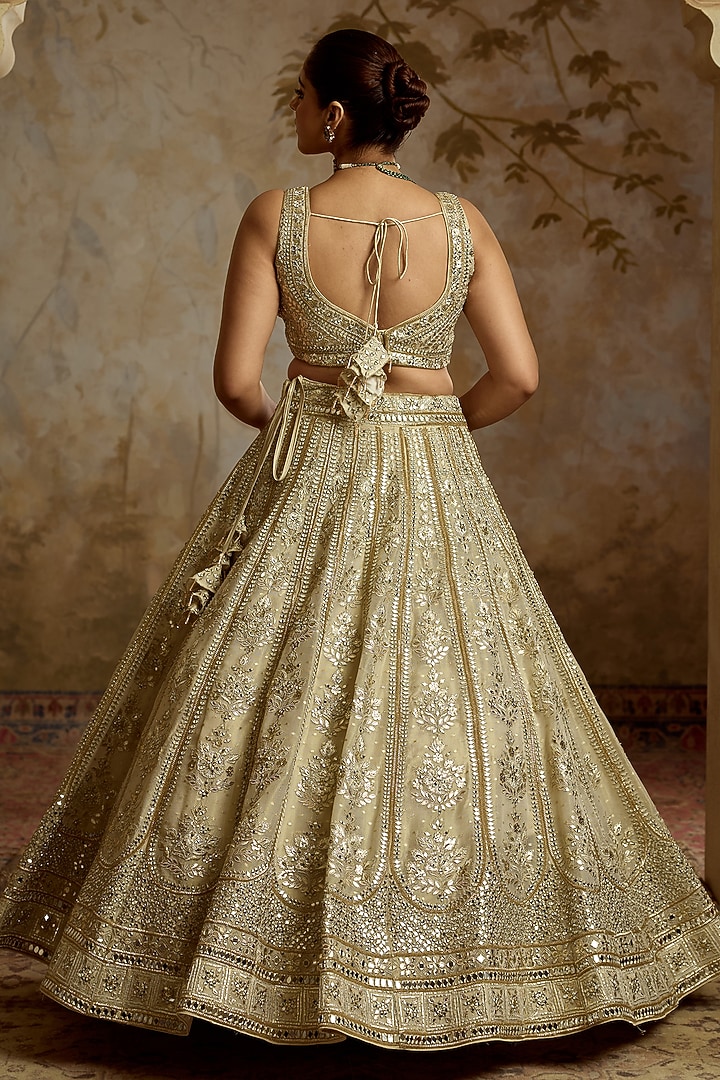 Ivory Tissue Mirror & Zari Embroidered Wedding Lehenga Set by Suhino at Pernia's Pop Up Shop