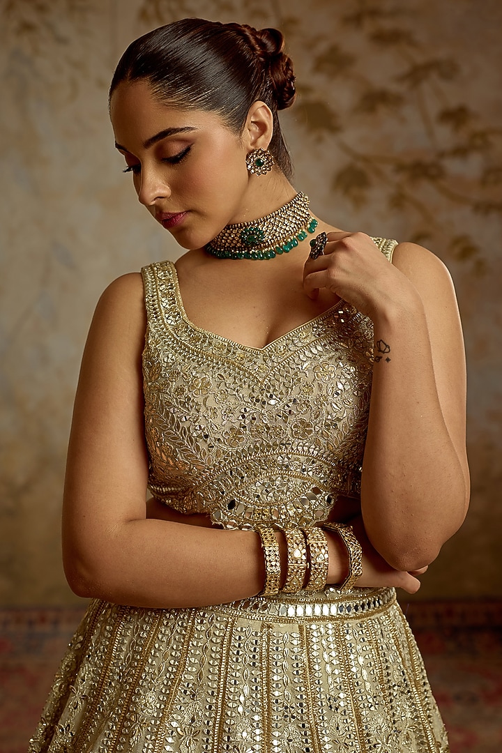 Ivory Tissue Mirror & Zari Embroidered Wedding Lehenga Set by Suhino at Pernia's Pop Up Shop