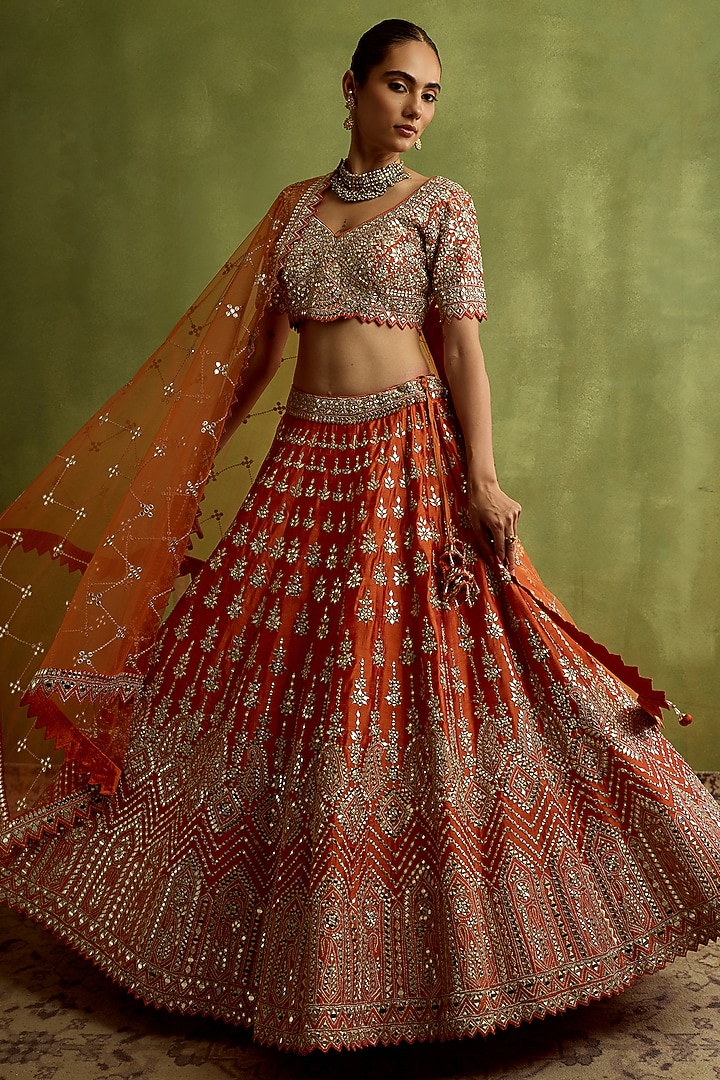 Rust Slub Slub Silk Mirror Embroidered Wedding Lehenga Set by Suhino at Pernia's Pop Up Shop