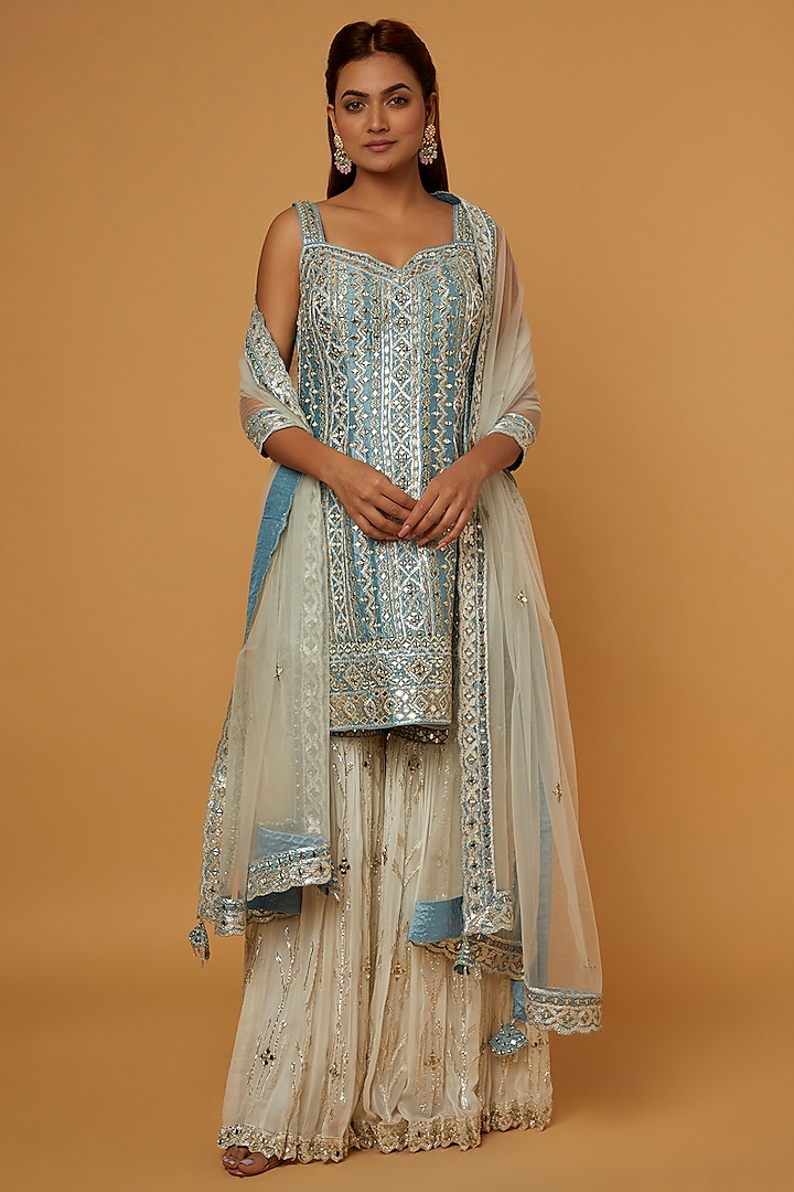 Off-White Slub Silk Resham Embroidered Gharara Set by Suhino