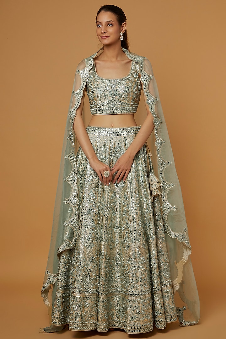 Off-White & Aqua Embroidered Lehenga Set by Suhino